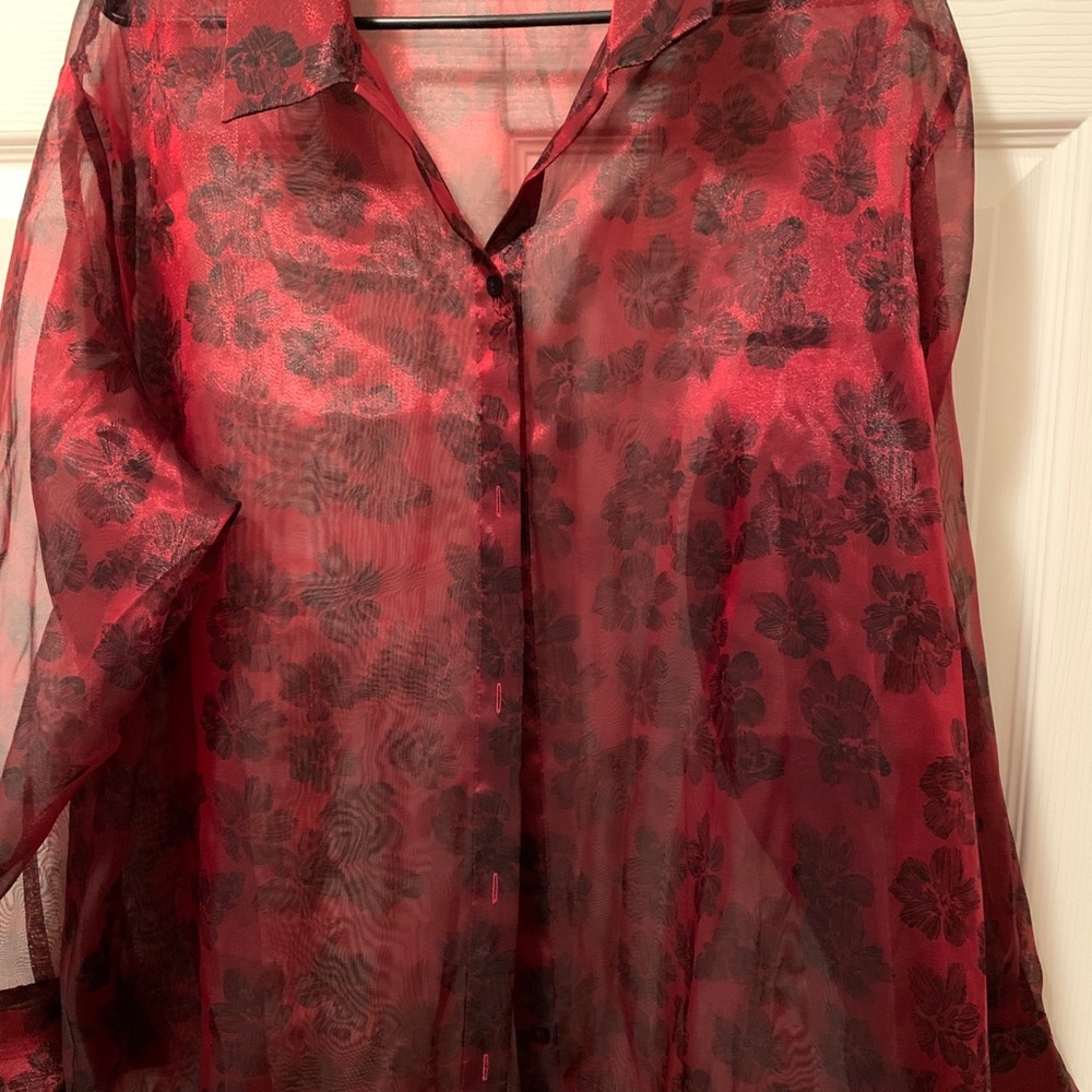 Woman’s sheer button up floral top